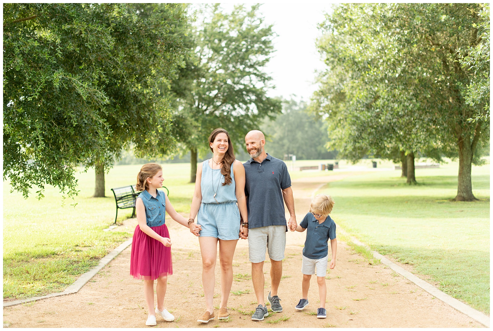 Family laughing together at Highland Rd Park family session in Baton Rouge LA