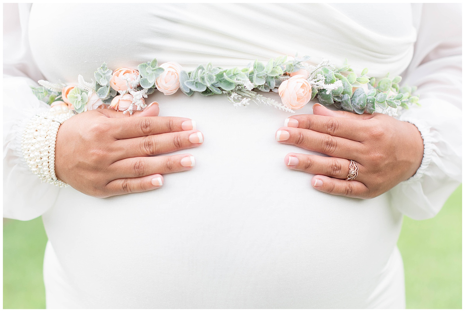 floral belt details of maternity session at Burden Center