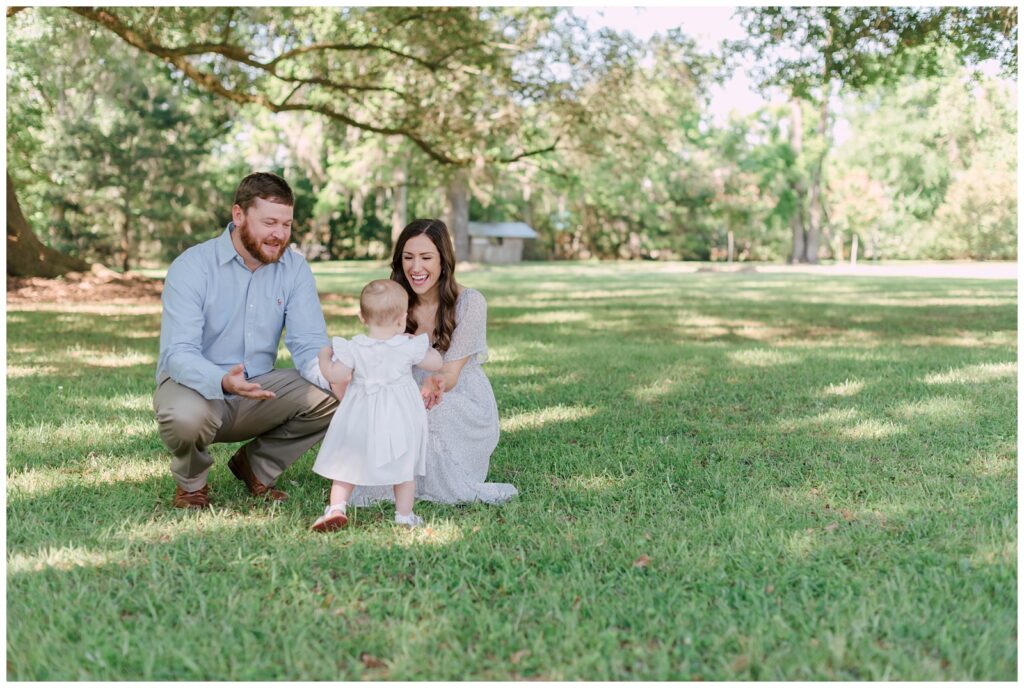 Baton Rouge Newborn Photographer - little girl runs to mom in the grass