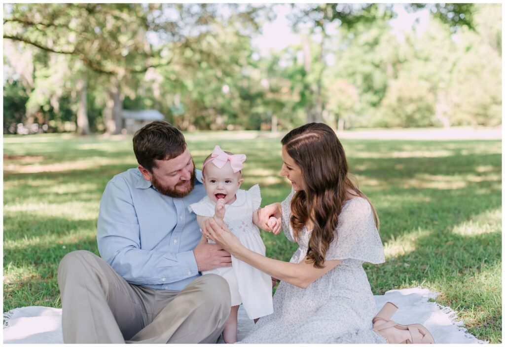 Baton Rouge Newborn Photographer - little girls sticks hand in her mouth