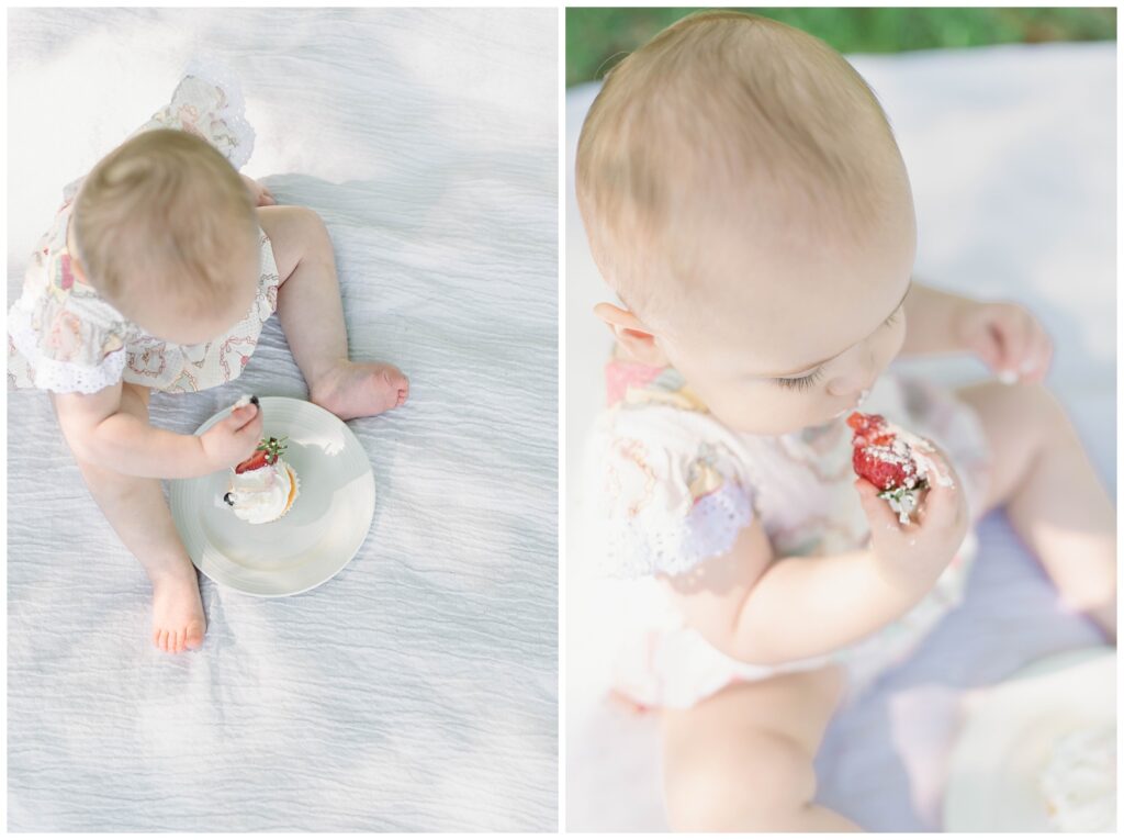 Baton Rouge Newborn Photographer- birds eye view of baby girl's head while eating a strawberry