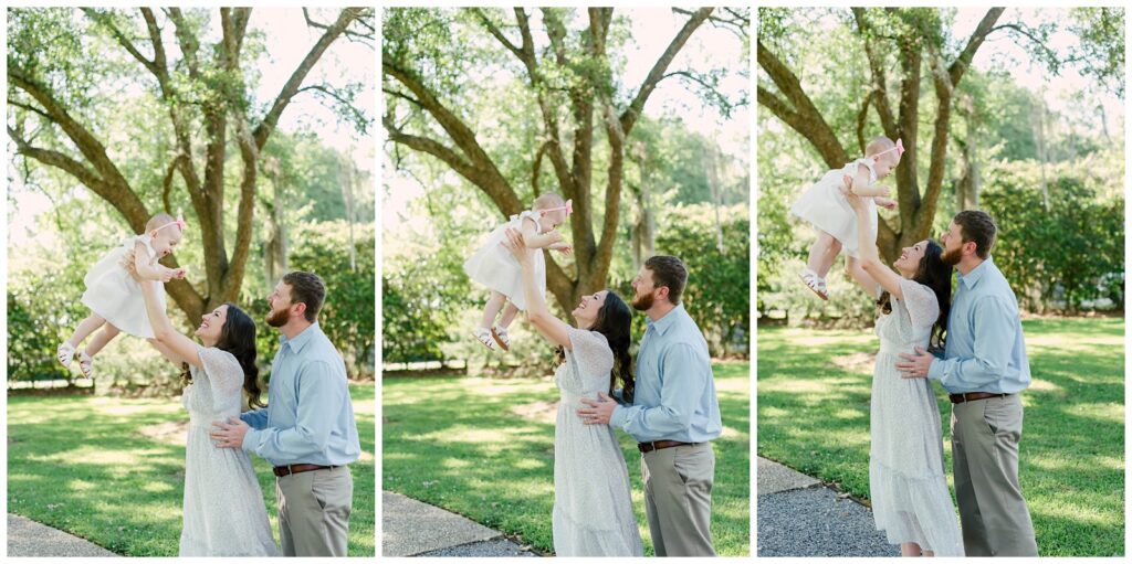 Baton Rouge Newborn Photographer, mom and dad throw baby girl in the air at one year milestone session